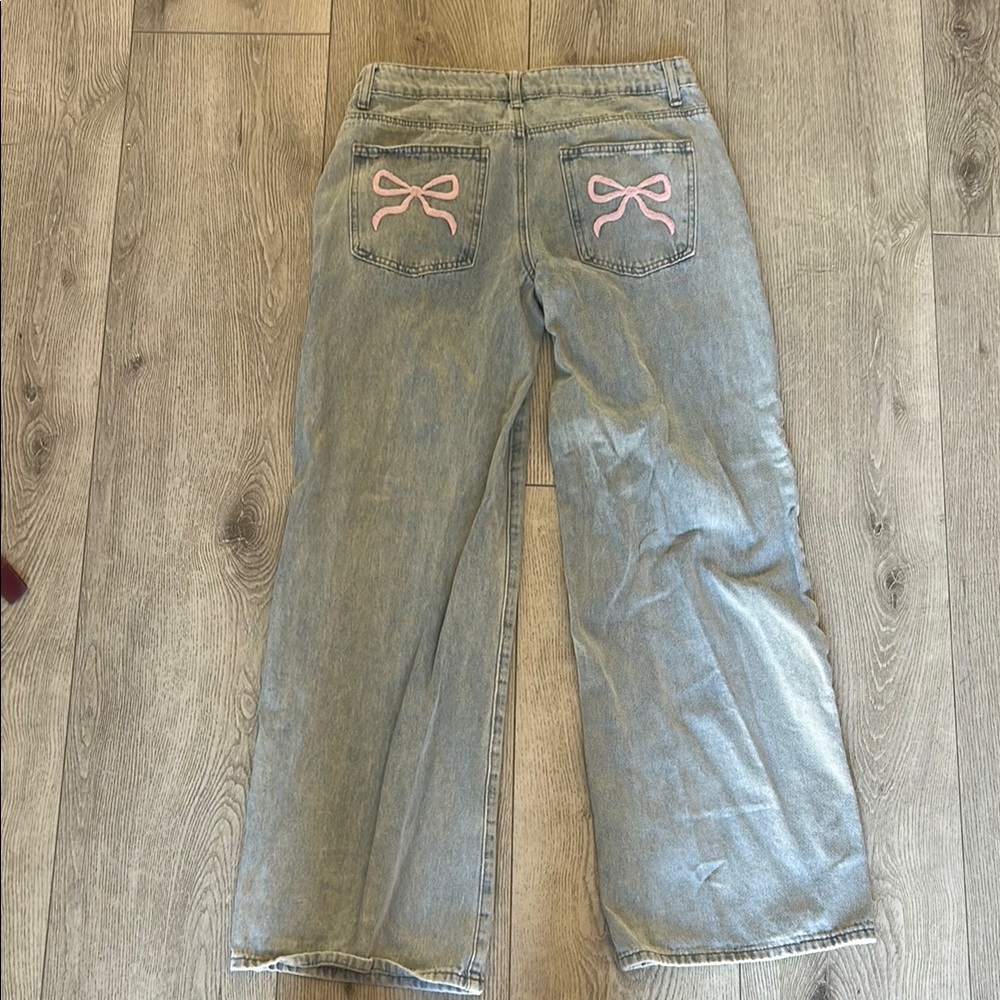 Light Blue Jeans with Pink Bow Accents